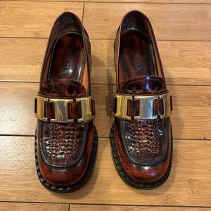 Prada woven leather loafers